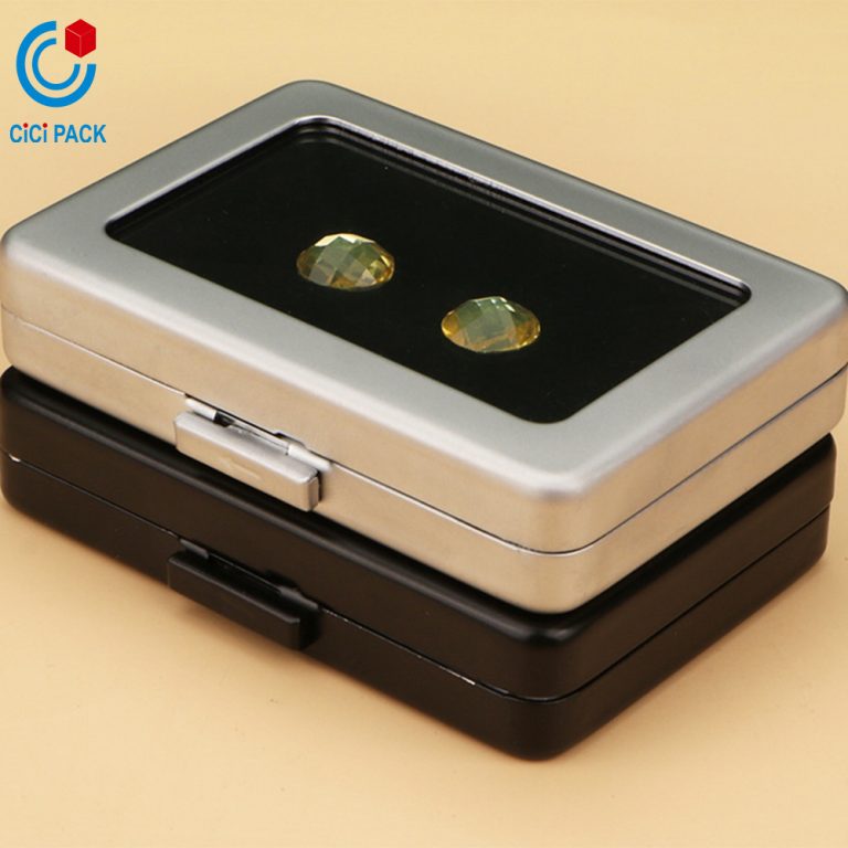 A metal ring face showcases a loose diamond box - Image 12