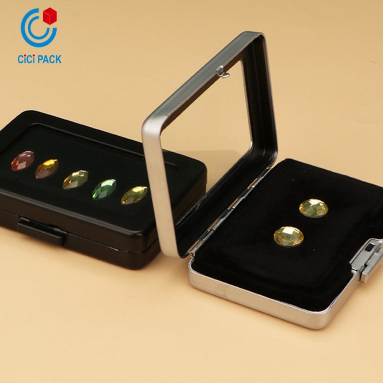 A metal ring face showcases a loose diamond box - Image 15